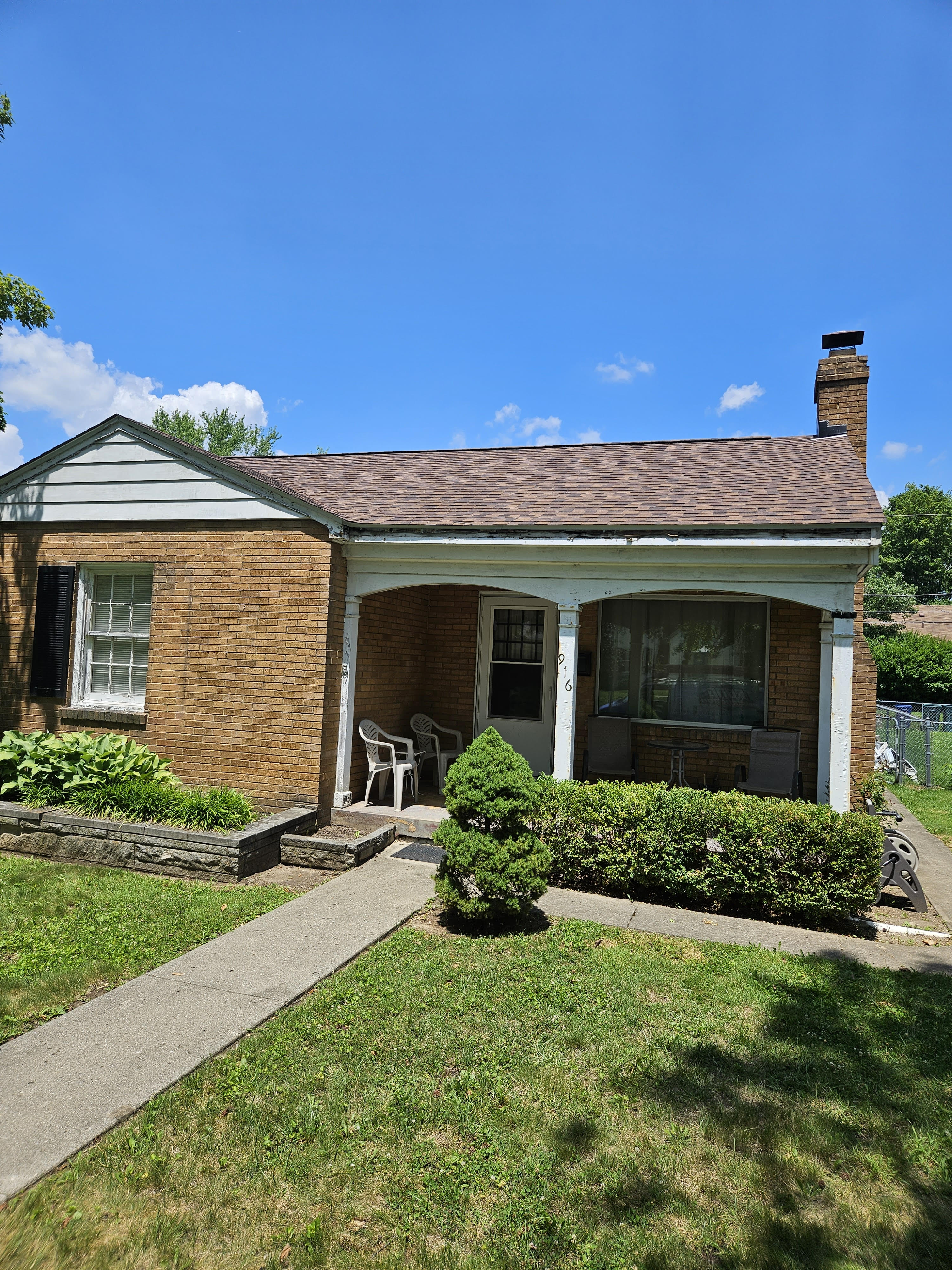 Bungalow Roof & Gutters — New shingles and seamless gutters on a Richmond bungalow.